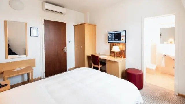 Bilder från hotellet Central City Hotel Rochat - nummer 1 av 10